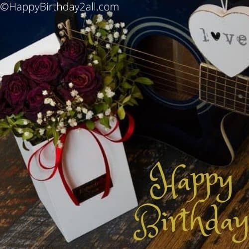 Happy Birthday wish with guitar and rose bouquet